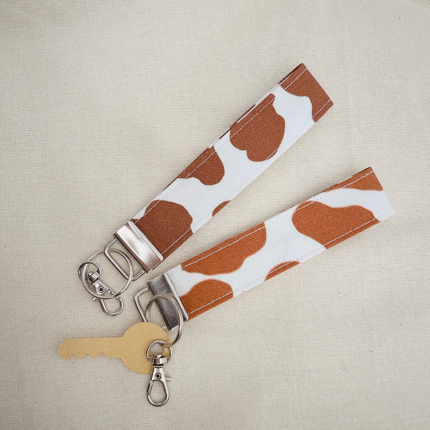 Cow Print brown key fob wristlet