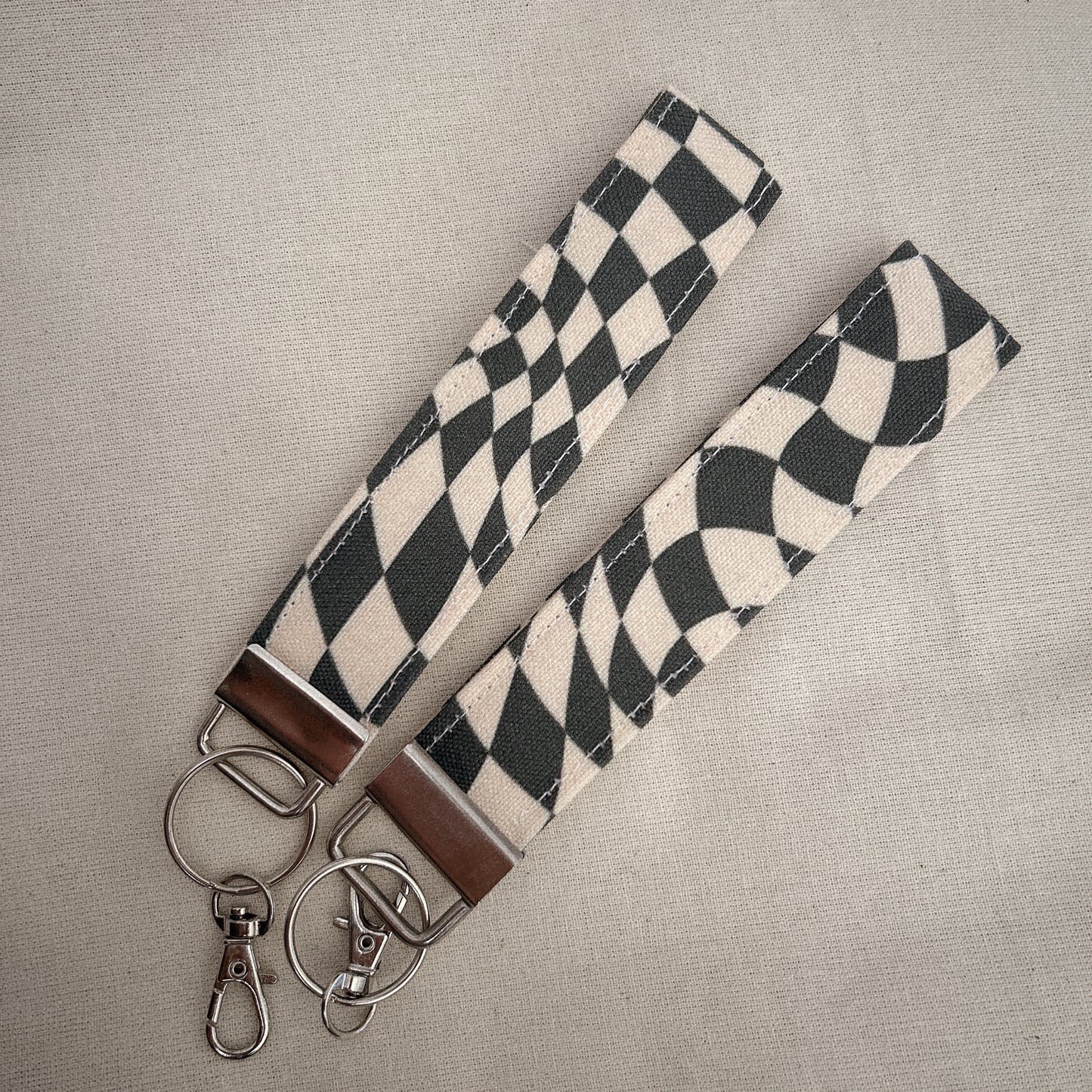 Wavy checkered black key fob wristlet